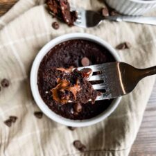 down view of mug brownie with a small scoop on a fork