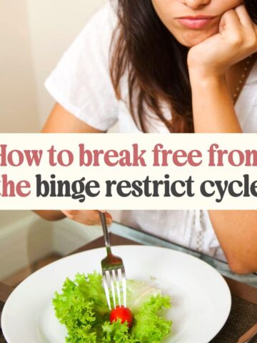 A woman holding a fork with a plate that has a small portion of vegetables.
