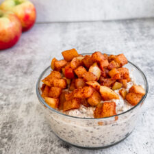 apple pie overnight oats topped with healthy baked apples.