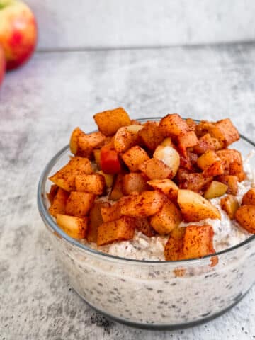 apple pie overnight oats topped with healthy baked apples.
