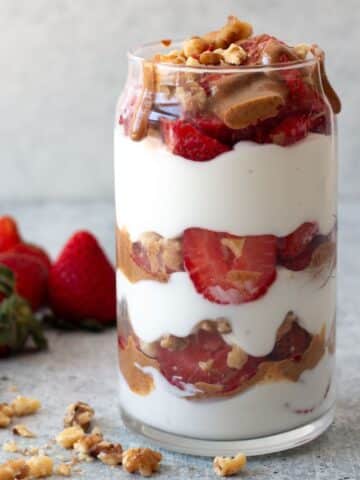 close up image of parfait with Greek yogurt and strawberries