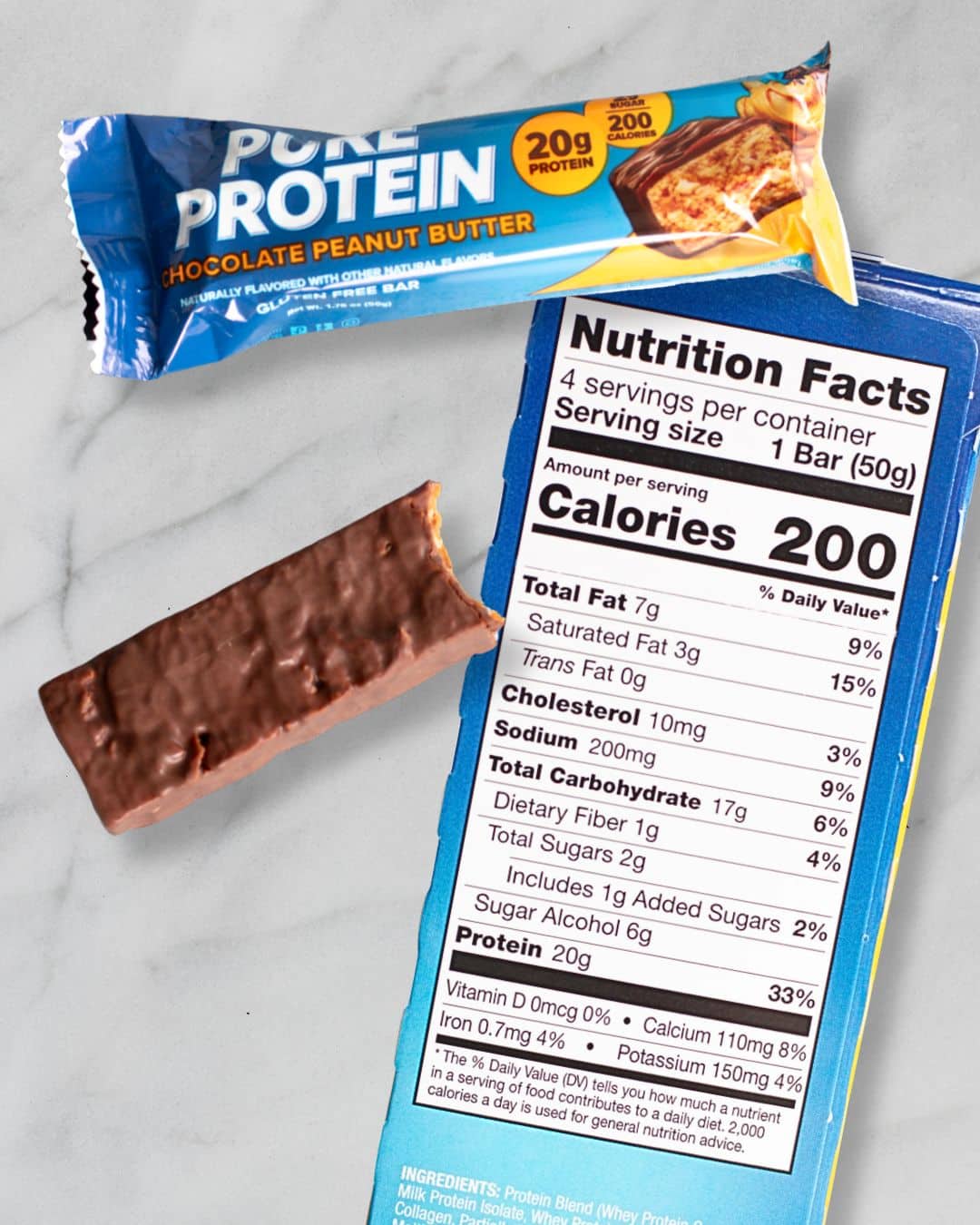 Pure Protein Chocolate Peanut Butter bar and wrapper beside a close-up of the nutrition facts label